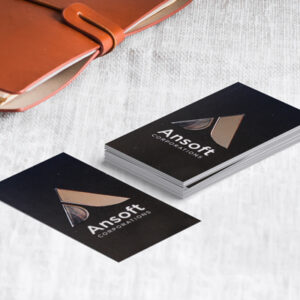 Close-up of raised foil printing technique on a business card